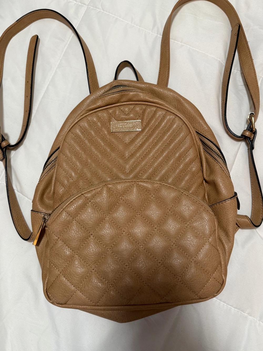 Aldo Quilted Tan Backpack with Gold Plate